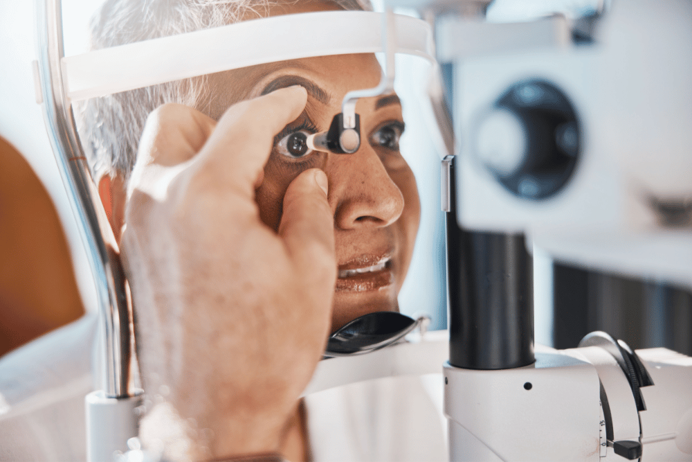 an older woman getting an eye exam